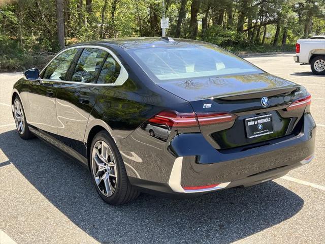 used 2024 BMW i5 car, priced at $59,990
