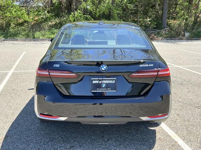 used 2024 BMW i5 car, priced at $59,990
