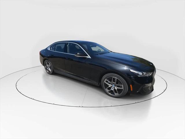 used 2024 BMW i5 car, priced at $59,990