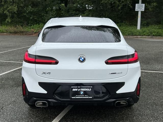used 2022 BMW X4 car, priced at $38,290