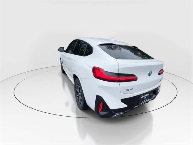 used 2022 BMW X4 car, priced at $38,290