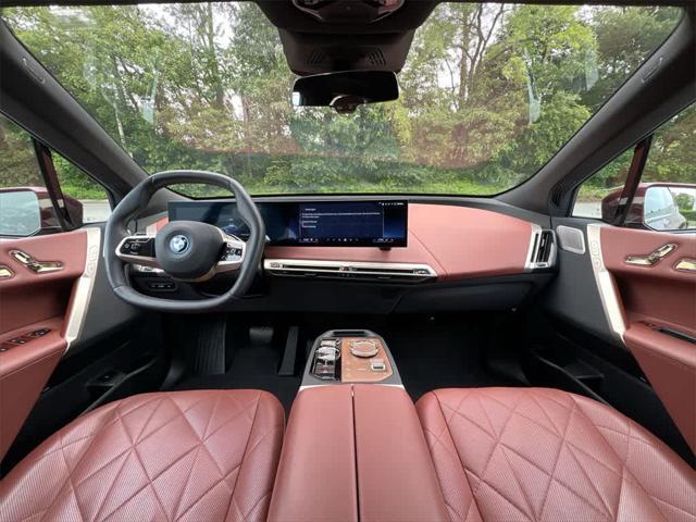 used 2024 BMW iX car, priced at $64,990