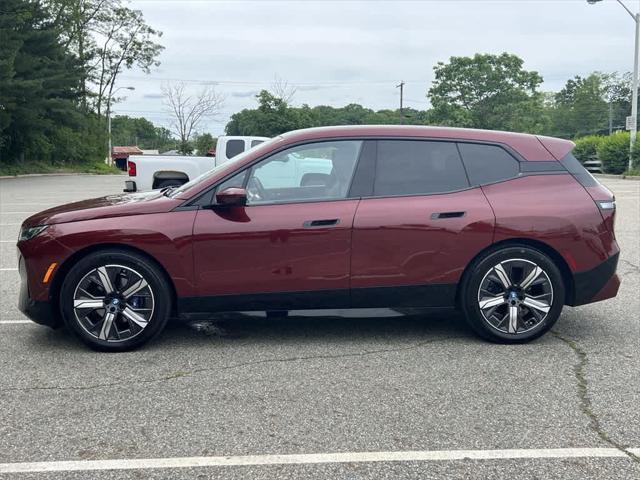 used 2024 BMW iX car, priced at $64,990