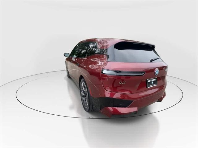 used 2024 BMW iX car, priced at $64,990