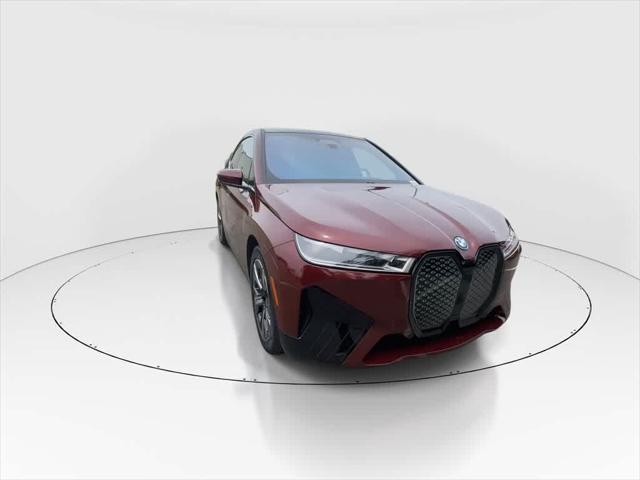 used 2024 BMW iX car, priced at $64,990