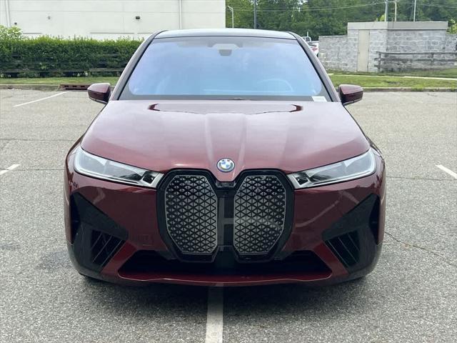 used 2024 BMW iX car, priced at $64,990