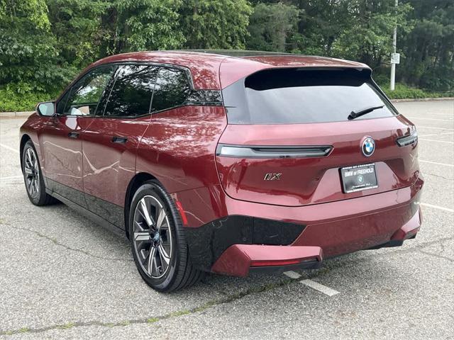 used 2024 BMW iX car, priced at $64,990