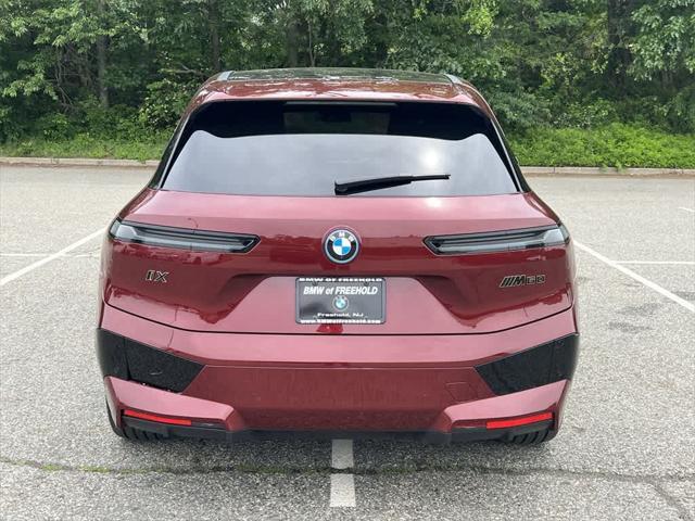 used 2024 BMW iX car, priced at $64,990