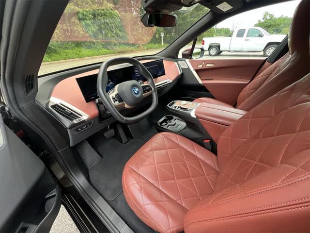 used 2024 BMW iX car, priced at $64,990