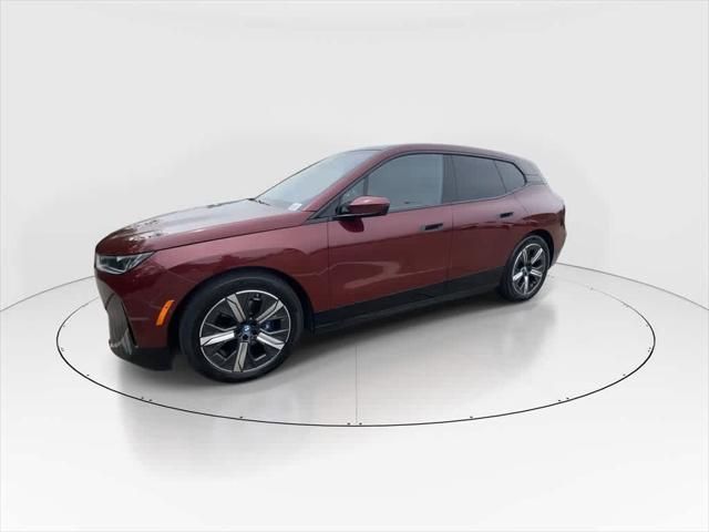 used 2024 BMW iX car, priced at $64,990