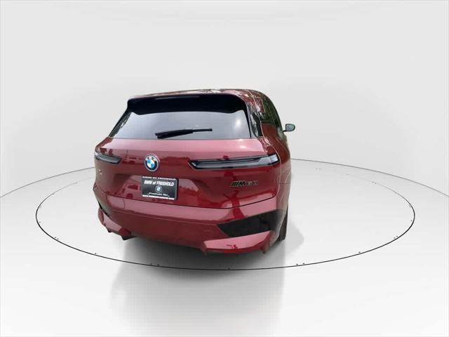 used 2024 BMW iX car, priced at $64,990