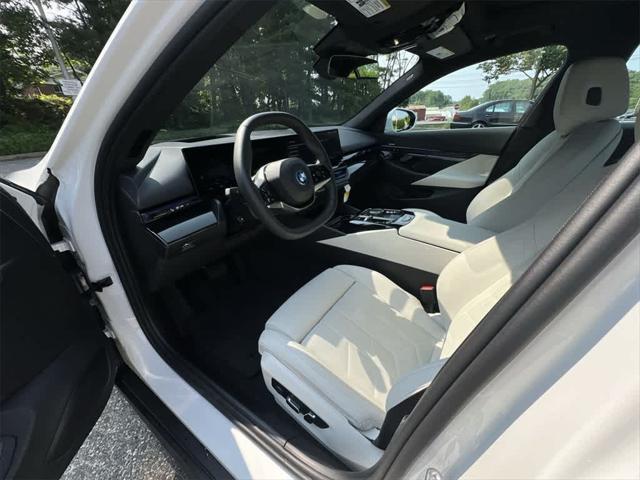 used 2025 BMW i5 car, priced at $59,990