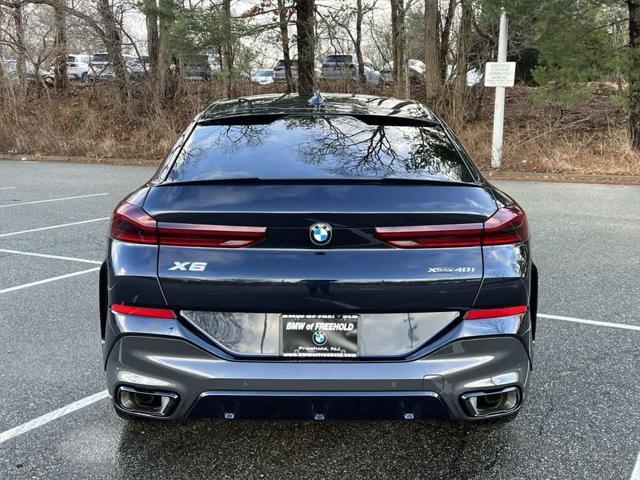 used 2023 BMW X6 car, priced at $65,990