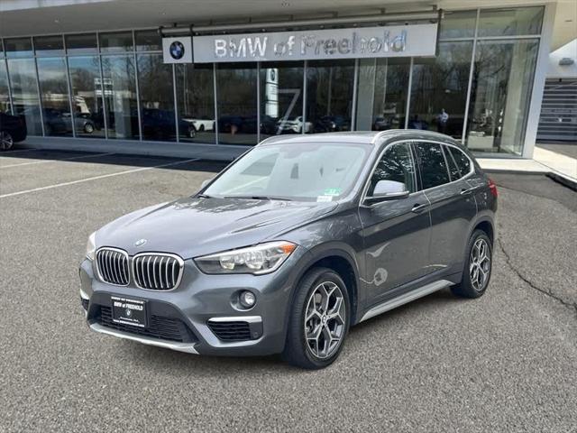 used 2018 BMW X1 car, priced at $19,990