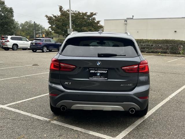 used 2018 BMW X1 car, priced at $19,990