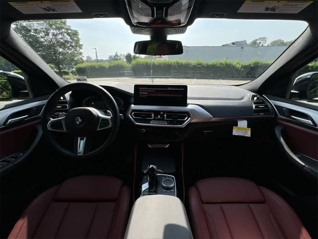 used 2025 BMW X4 car, priced at $54,990