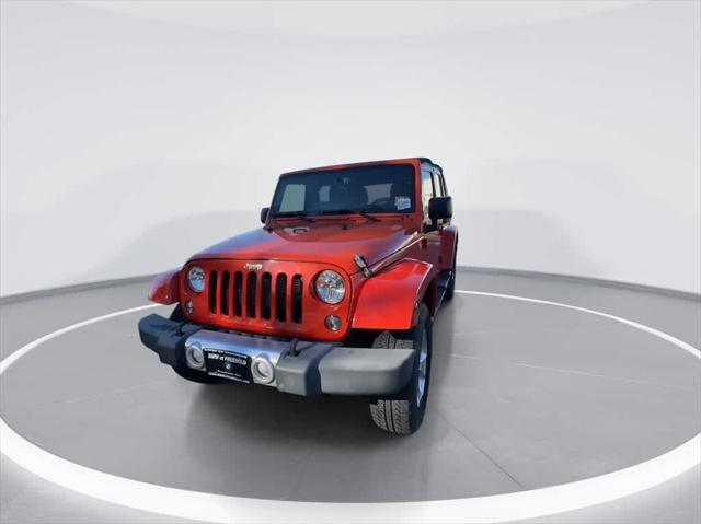 used 2015 Jeep Wrangler Unlimited car, priced at $15,990