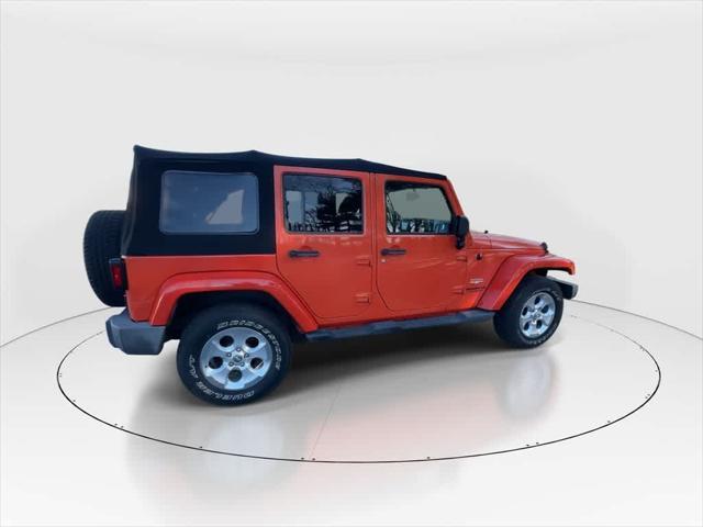 used 2015 Jeep Wrangler Unlimited car, priced at $13,990