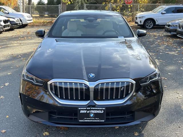 used 2024 BMW i5 car, priced at $59,490