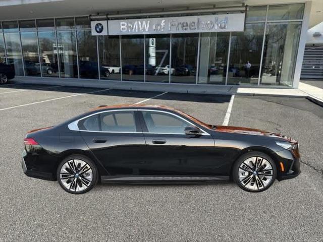 used 2024 BMW i5 car, priced at $65,990