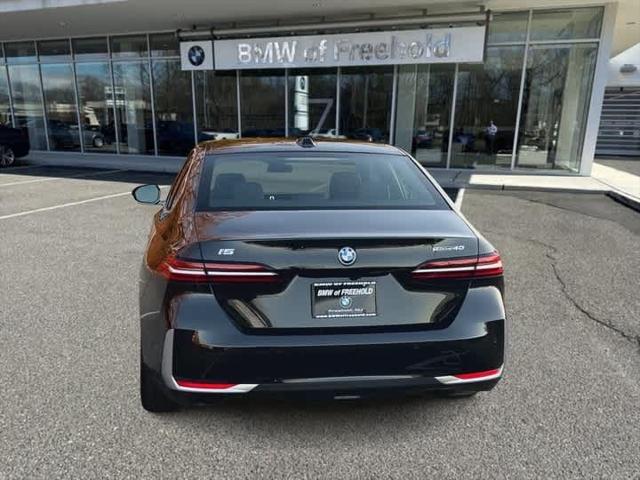 used 2024 BMW i5 car, priced at $65,990