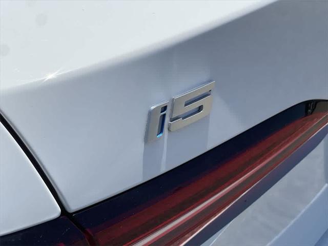 used 2024 BMW i5 car, priced at $72,990