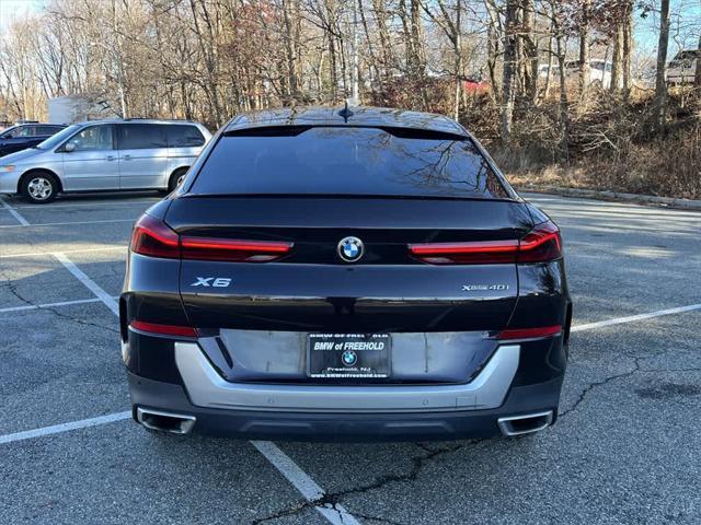 used 2022 BMW X6 car, priced at $39,790