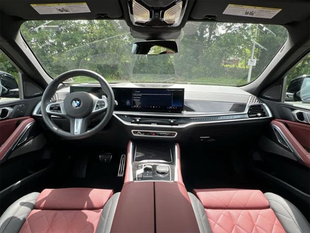 used 2025 BMW X6 car, priced at $82,990