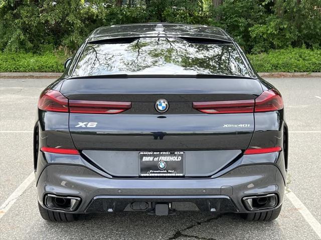 used 2025 BMW X6 car, priced at $82,990