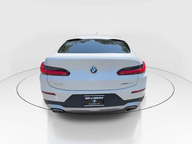 used 2022 BMW X4 car, priced at $41,990