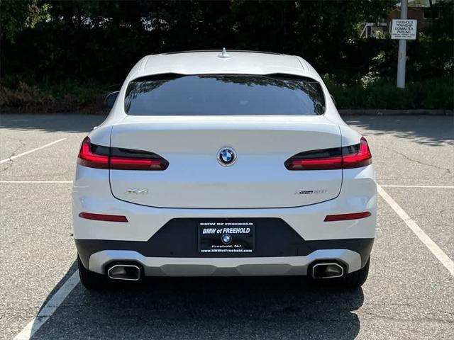 used 2022 BMW X4 car, priced at $41,990