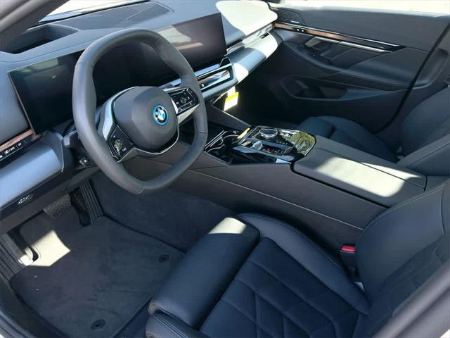 used 2024 BMW i5 car, priced at $61,990