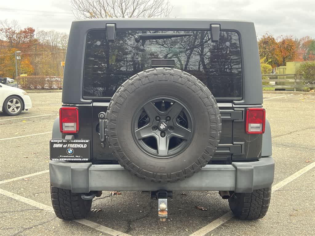 used 2016 Jeep Wrangler car, priced at $13,990