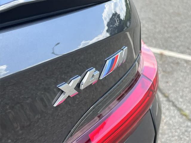 used 2024 BMW X4 M car, priced at $64,990