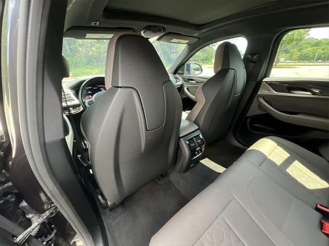 used 2024 BMW X4 M car, priced at $64,990
