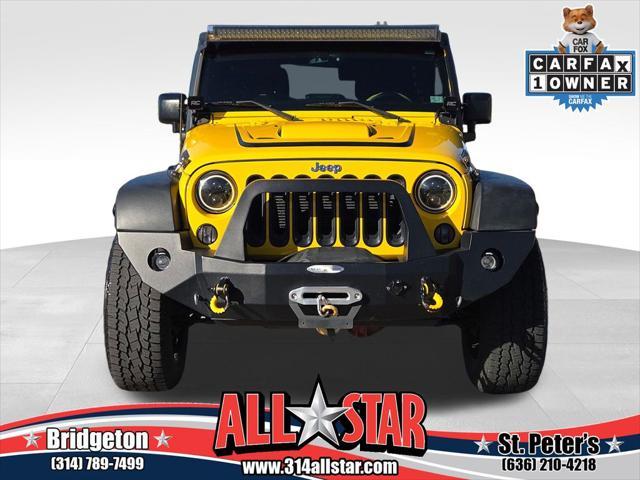 used 2015 Jeep Wrangler Unlimited car, priced at $22,456