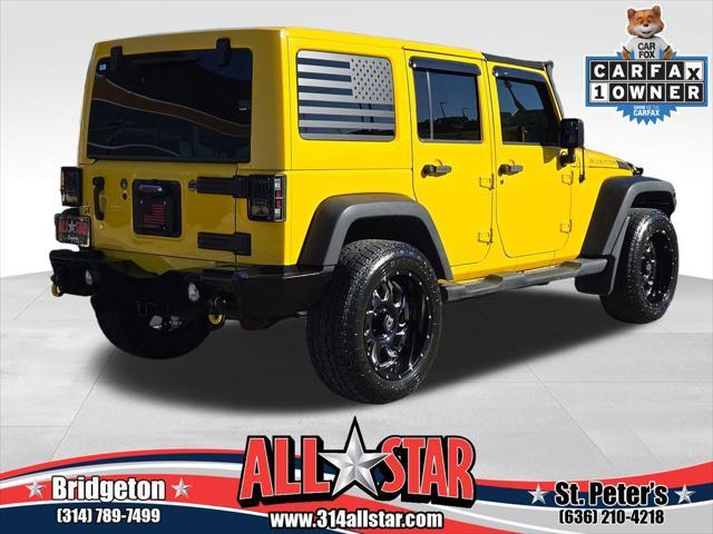 used 2015 Jeep Wrangler Unlimited car, priced at $22,456