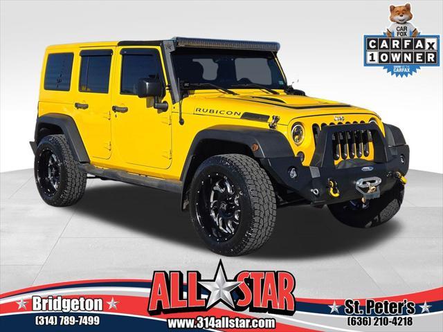 used 2015 Jeep Wrangler Unlimited car, priced at $22,456