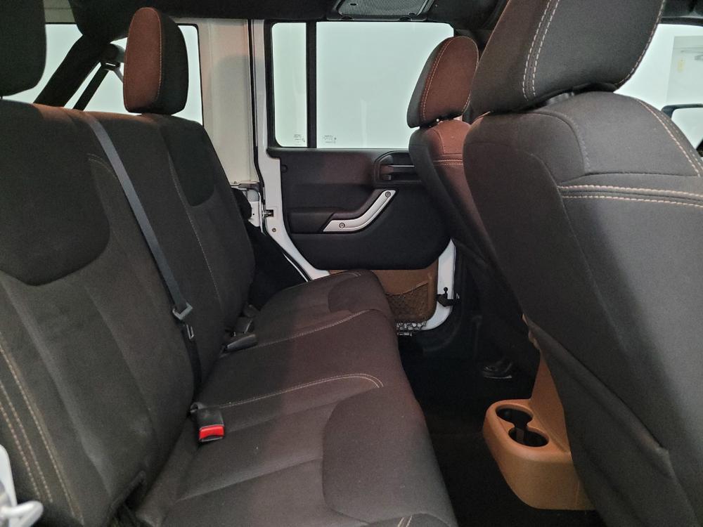 used 2015 Jeep Wrangler Unlimited car, priced at $18,295