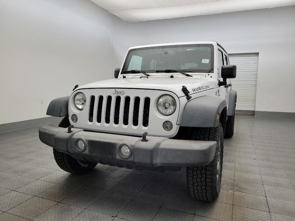 used 2015 Jeep Wrangler Unlimited car, priced at $18,295
