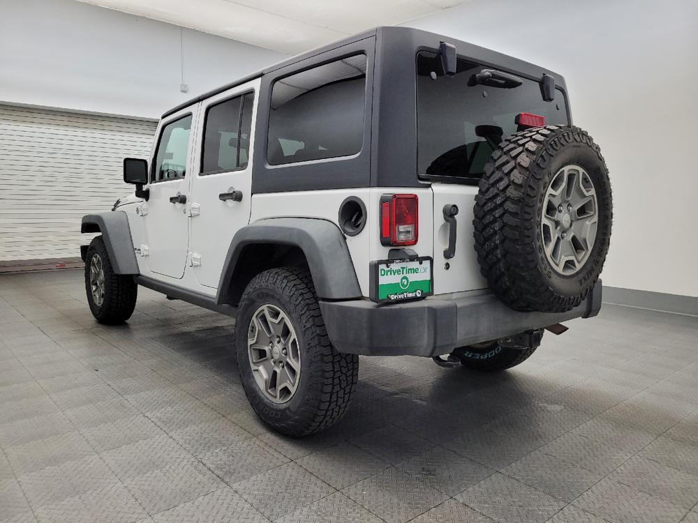 used 2015 Jeep Wrangler Unlimited car, priced at $18,295