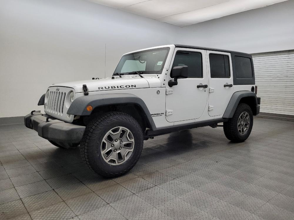 used 2015 Jeep Wrangler Unlimited car, priced at $18,295