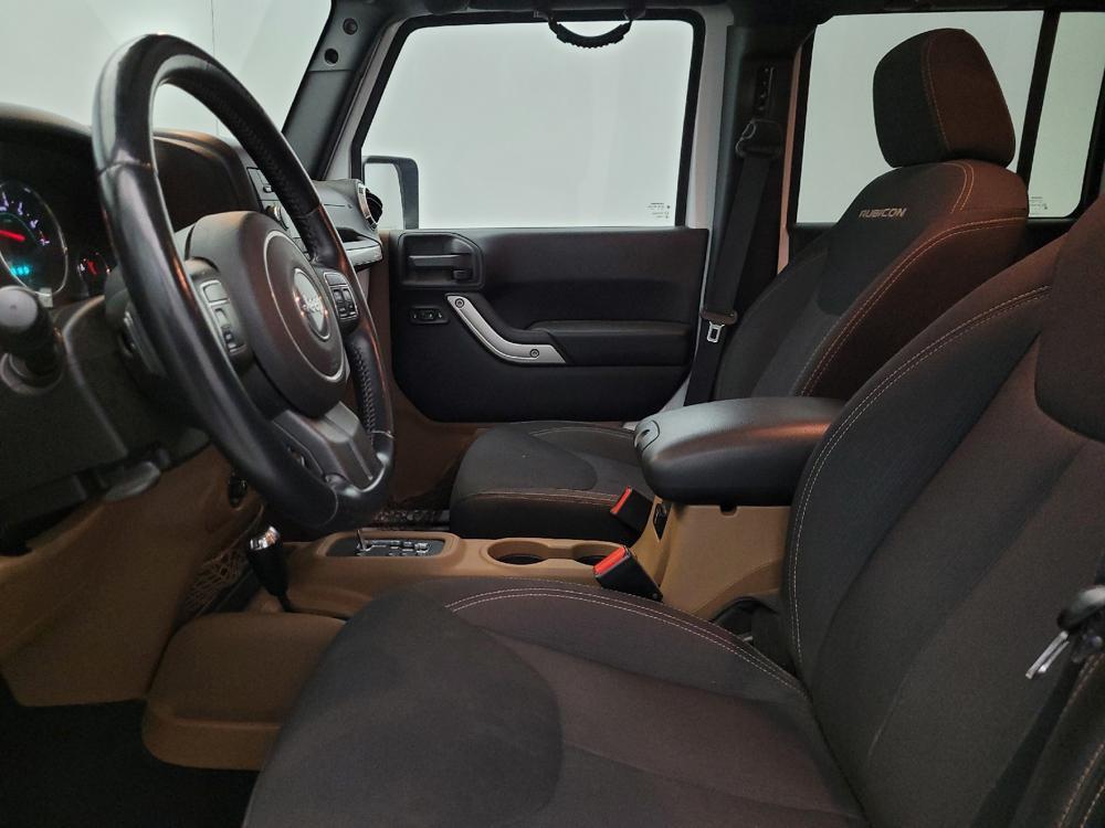 used 2015 Jeep Wrangler Unlimited car, priced at $18,295