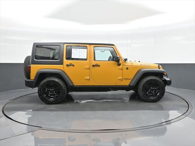 used 2014 Jeep Wrangler Unlimited car, priced at $13,798