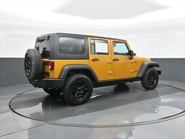 used 2014 Jeep Wrangler Unlimited car, priced at $13,798