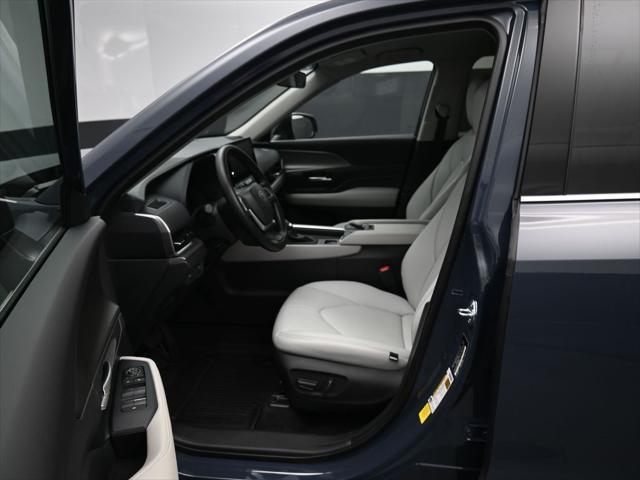 used 2025 Toyota Highlander Hybrid car, priced at $52,992