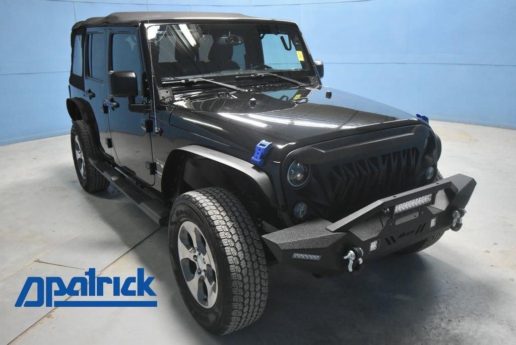 used 2016 Jeep Wrangler Unlimited car, priced at $23,984