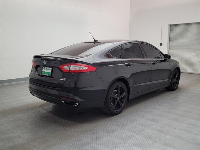 used 2016 Ford Fusion car, priced at $15,395