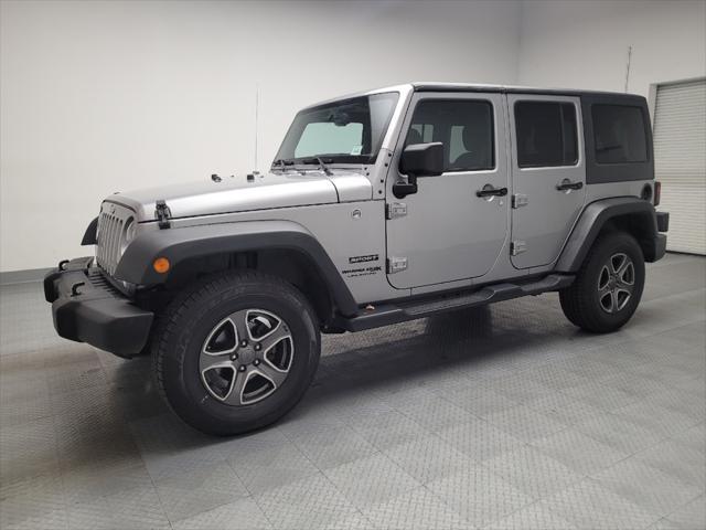 used 2018 Jeep Wrangler JK Unlimited car, priced at $22,095