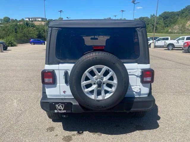 used 2023 Jeep Wrangler car, priced at $33,900